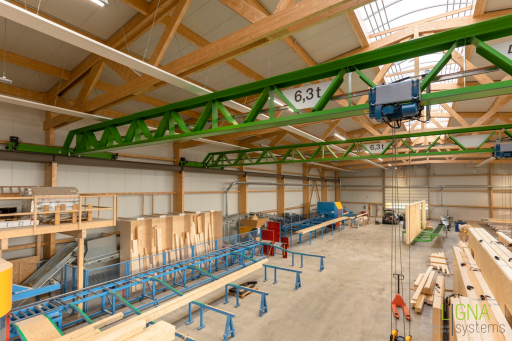 Zimmerei mit Kranbahn Holzbau Stamm